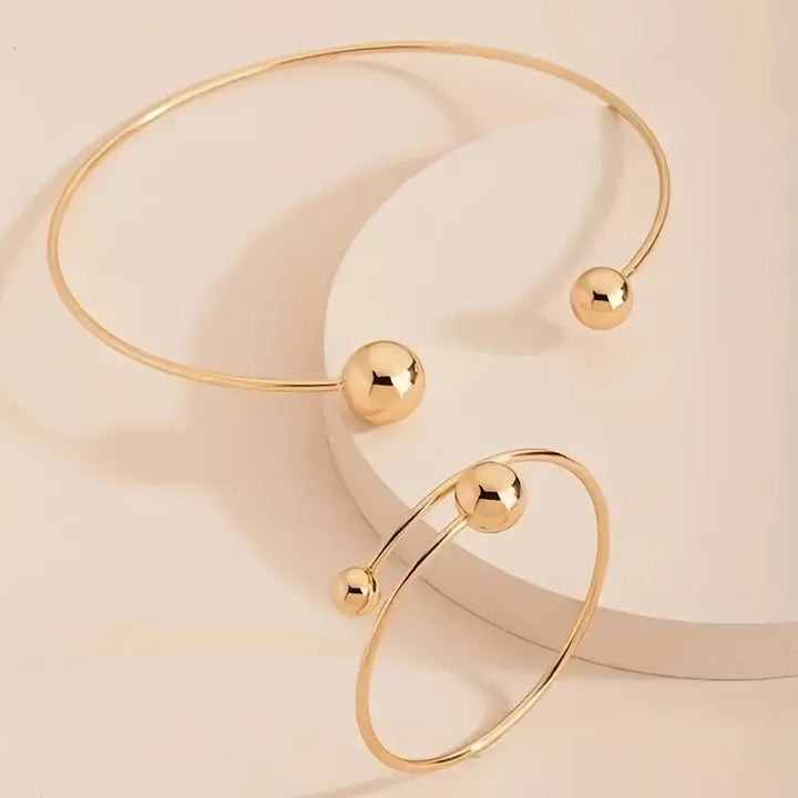 Conjunto minimalista de colar Glow e pulseira de punho dourado