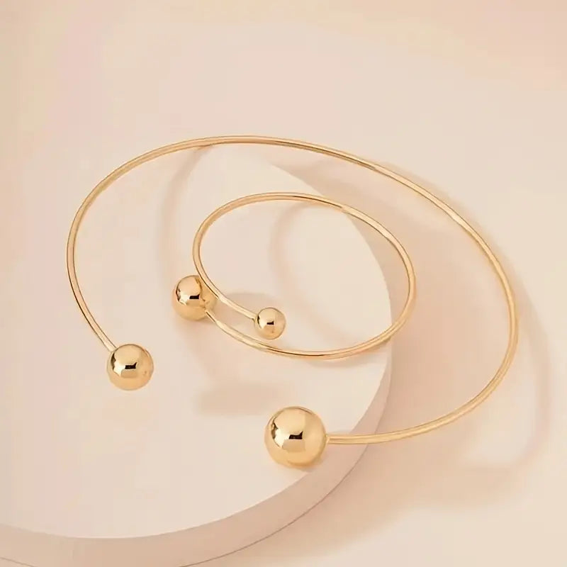 Conjunto minimalista de colar Glow e pulseira de punho dourado